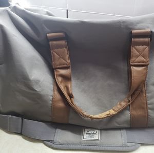 The Herschel supply company gray duffel travel bag